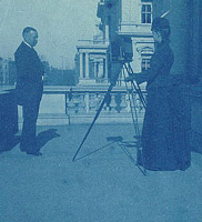 Johnston photographing on a balcony of the State, War and Navy Building
