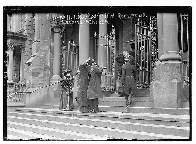 Mrs. H.H. Rogers and H.H. Rogers Jr. leaving church (LOC)