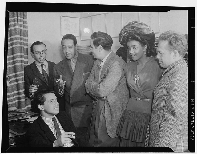 [Portrait of Ahmet M. Ertegun, Nesuhi Ertegun, Duke Ellington, William P. Gottlieb, and Dave Stewart, William P. Gottlieb's home, Maryland, 1941] (LOC)