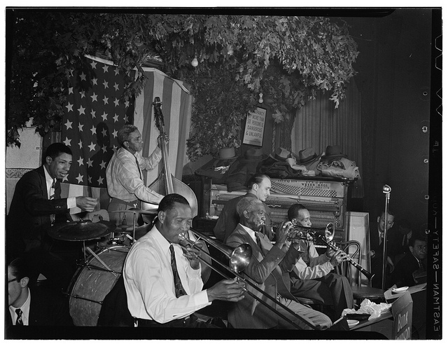 [Portrait of Bunk Johnson, George Lewis, Alcide Pavageau, Kaiser Marshall, Jim Robinson, and Don Ewell, Stuyvesant Casino, New York, N.Y., ca. June 1946] (LOC)