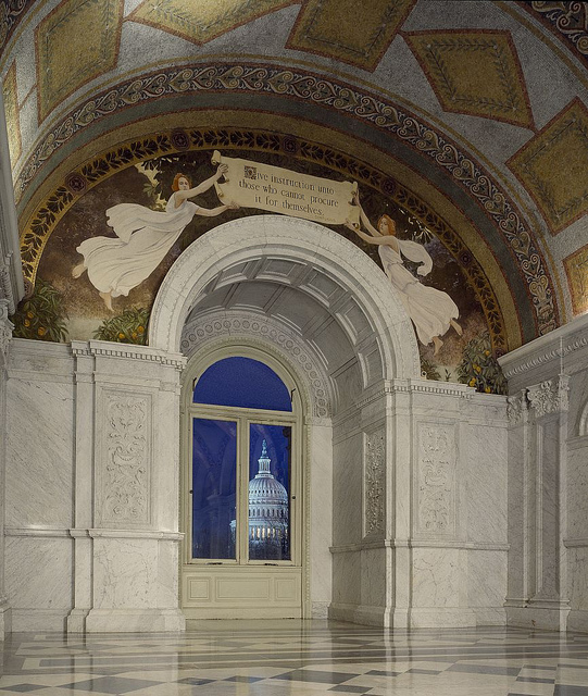 [North Corridor, Great Hall. View of the U.S. Capitol at sunrise, seen through a window below a mural by Charles Sprague Pearce that shows female figures with quotation from Confucious that begins "Give instruction ...." Library of Congress Thomas Jeffers