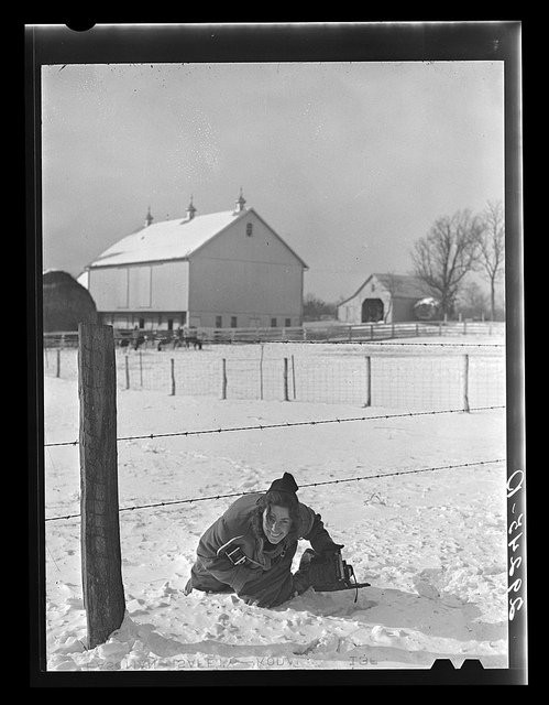 Marion Post Wolcott with Rolleiflex and Speed Graphic in hand in Montgomery County, Maryland (LOC)