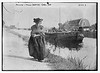 Holland -- woman drawing canal boat [pulling] (LOC) by The Library of Congress