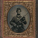 [Unidentified soldier in Union uniform with eagle breast plate, cartridge box, and cap box holding musket with bayonet in scabbard] (LOC)