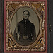 [Unidentified young soldier in Union rifleman's uniform and shoulder scales with musket and attached U.S. Model 1862 sword bayonet] (LOC)