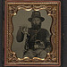 [Unidentified soldier in Union cavalry uniform and Hardee hat with European import saber and French LeFaucheux pinfire revolver] (LOC)