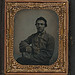 [Unidentified soldier in Confederate uniform wearing chain] (LOC)
