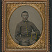 [Unidentified young soldier in Confederate uniform holding book] (LOC)