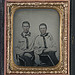 [Two unidentified soldiers in Confederate battle shirts] (LOC)