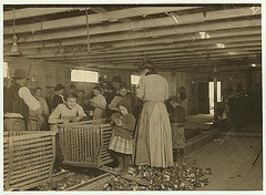 Four-year-old Mary, who shucks two pots of oysters a day at Dunbar. Tends the baby when not working ... Location: Dunbar, Louisiana (LOC)