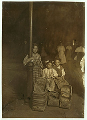 Marie Costa, Basket Seller, 605 Elm St., Sixth St. Market, Cincinnati. 9 P.M. Had been there since 10 A.M. Sister and friend help her.  Location: Cincinnati, Ohio. (LOC)