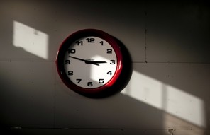 A clock is displayed on a wall at the Verdin Corp. production facility in Cincinnatti, Ohio, U.S., on Friday, Nov. 11, 2012. The Institute for Supply Management is scheduled to release the results of its survey of purchasing managers at U.S. factories on Dec. 3. Photographer: Ty Wright/Bloomberg