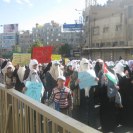 Photo: Women and children protest against the government's austerity drive.