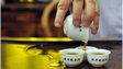 Hong Kong tea shop owner prepares Chinese tea the traditional way (2011 file picture)