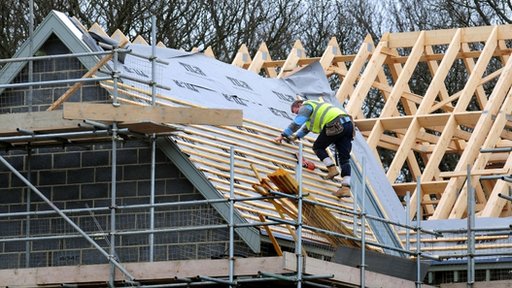 Roof workers building new houses in Derbyshire