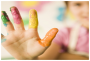 Child's hand with fingerpaint