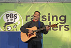 Musician performing in a tent