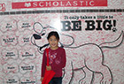 Fan in front of the Scholastic autograph board