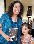 Margarita Engle with a fan