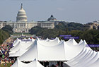Book festival tents with the dome of the Capitol Building in the background