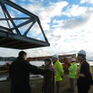 Photo: Senator Shaheen attended the float-in of the new Memorial Bridge in Portsmouth. With the use of tugboats and a temporary jacking system, the new 300-foot-long span was positioned and then lowered onto the new piers. This is the first of three sections that will create the new Memorial Bridge.
The bridge, scheduled to be completed this summer, will once again provide critical means of transportation that will enhance trade and commerce, tourism, and community life to strengthen the Portsmouth region. (January 15, 2013. Portsmouth, NH.)