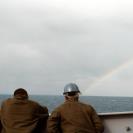 Photo: DN-ST-91-08394

Crewmen aboard the guided missile frigate USS NICHOLAS (FFG-47) look at a rainbow as the ship departs Bermuda to begin the final leg of its journey to Naval Station, Charleston, S.C.  The NICHOLAS is returning to Charleston following its deployment to the Persian Gulf region for Operation Desert Shield and Operation Desert Storm. Film