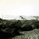 Photo: Anzio Operation, 1944.  “DUKW” Amphibious Trucks prepare to move inland after landing on the Fifth Army Beachhead near Anzio, 22 January 1944.  LST in center appears to be USS LST-385.  LST 349 and LCT 198 are at right.  Note other LSTs, LCIs, and DUKWs offshore.  Photographed by Thomas.   U.S. Army Photograph, SC 184436.