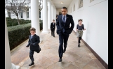 President Obama Runs Along the Colonnade