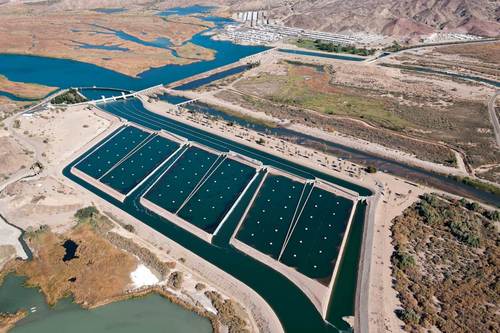 The Imperial Dam and the All-American Canal System, located in the southeastern corner of California, includes the Imperial Diversion Dam and Desilting Works, the 80-mile-long All-American Canal, the 123-mile-long Coachella Canal, and appurtenant structures. Photo by Andy Pernick, Bureau of Reclamation.