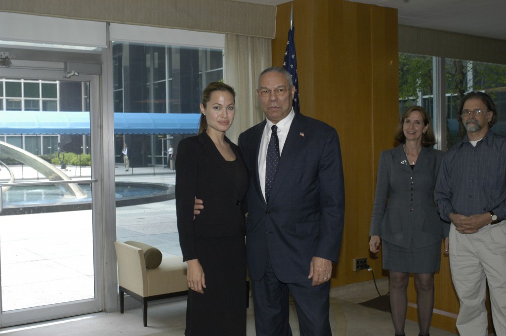 Actress Angelina Jolie with State Secretary Colin Powell at a reception in the Harry S. Truman Building
