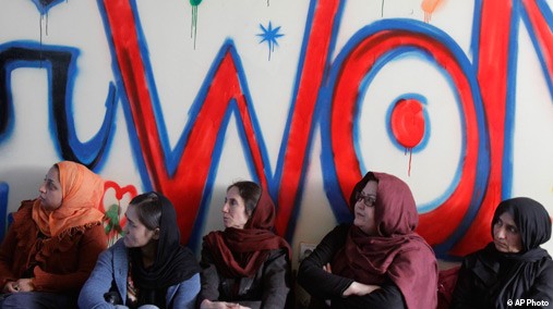 Afghan women gather during the opening ceremony of the Sahar Gul net cafe, the first internet cafe for women, opened in Kabul, Afghanistan, March 8, 2012. [AP File Photo]