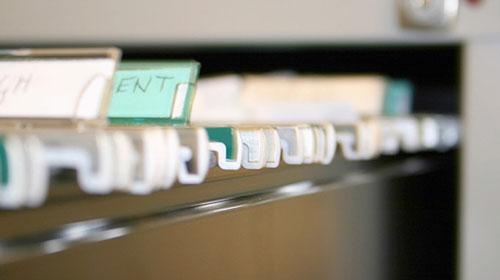 A file drawer filled with file folders