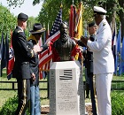 Trooper James Madison, President of the Greater Kansas City and Leavenworth Chapter of the 9th and 10th Horse Cavalry Association, and Command Sgt. Maj.  Christopher Greca unveil the bust of Brig. Gen. Benjamin Henry Grierson in the “Circle of Firsts” near the Buffalo Soldier Monument on Fort Leavenworth while Lt. Gen. David G. Perkins, Commander of the Combined Arms Center, and Retired Navy Cmdr. Carlton Philpot, Original member of the Buffalo Soldier Monument Committee look on.
Brig. Gen. Benjamin Henry Grierson organized the 10th U.S. Cavalry Regiment following the Civil War and spent more than 20 years as its commander where he became a leading advocate of the equal treatment of African American Soldiers.