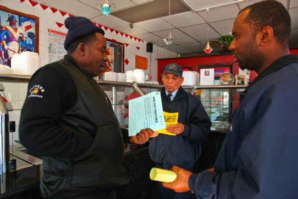Queens, N.Y., Jan. 8, 2013 -- Community Relations Specialist Jean Ones Austin distributes flyers to Haitian small businesses about recovery information following Hurricane Sandy. FEMA provides assistance information to everyone that was impacted by Hurricane Sandy. 