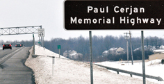 Designated the Paul Cerjan Memorial Highway, northern New York's new I-781 connector road between I-81 and Fort Drum's north gate opened to traffic, Dec. 6, 2012. (U.S. Army photo by Steve Ghiringhelli)