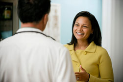 A potential volunteer talks with her doctor about participating in a clinical trial.