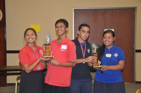 The teams from Co-op High School (left) and Baptist High School (right) pose with their trophies after tying for 1st place(Credit: State Department).