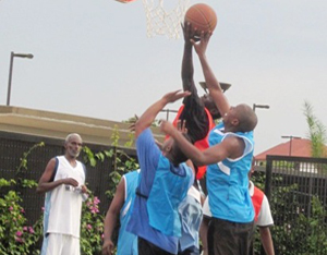 Men playing basketball.(Photo Credit: State Dept.)