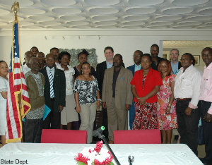 Group stands and poses (State Dept.)