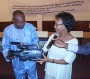 Ambassador Williams presents a new camera to Boubacar Diallo, President of la Maison de la Presse (Niamey Embassy photo)
 
  
