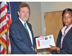 Amb Owen presenting a certificate to Police Officer E.G. Macauley (PDF 73KB)
