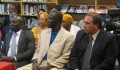 Ambassador Laskaris (Right) and Minister of Human Rights Kalifa Gassama Diaby (Left and wearing a blue tie) listen (State Dept)