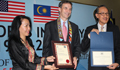 Ambassador Jones and Datuk Masidi with the exchanged certificates.  Looking on is Joanna Kitingan, Director of Sabah Museum. (U.S. Embassy photo)