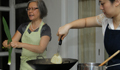 Chef Rohani Jelani demonstrates on the cooking method for chicken rendang. (U.S. Embassy photo)