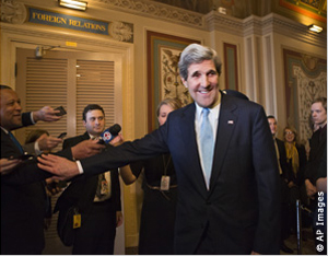 John Kerry smiles after receiving unanimous approval from the Senate Foreign Relations Committee January 29 to become secretary of state. (AP Images)