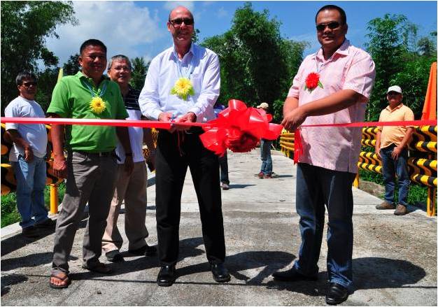 U.S. Helps Build New Bridge To Town