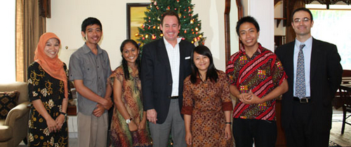 Consul General Joaquin Monserrate and PAO Andrew Veveiros pose with participants of SUSI program on Religious Pluralism at the consul general’s residence on Dec 19, 2012.