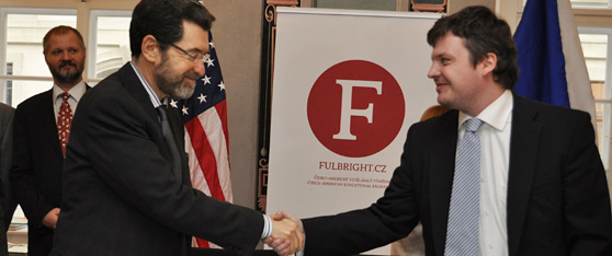 U.S. Ambassador to the Czech Republic Norman Eisen and Education Minister Deputy for Research and Universities Tomáš Hruda shake hands after signing the agreement of inclusion into the Fulbright  Distinguished Chair program, American Center, January 8, 2013. (photo U.S. Embassy Prague)