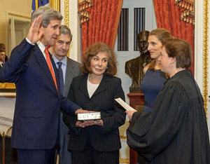 Supreme Court Justice Elena Kagan swears in Secretary of State John Kerry on February 1, 2013 in the Foreign Relations Committee Room in the Capitol. They were joined by his wife Teresa, daughter Vanessa, brother Cameron, and his Senate staff. (Photo: Department of State)