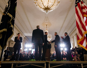 President Barack Obama shakes hands with former Sen. Chuck Hagel in the East Room of the White House, Jan. 7, 2013. The President nominated Sen. Hagel for Secretary of Defense and John Brennan, Assistant to the President for Homeland Security and Counterterrorism, second from left, for Director of the CIA. Also pictured on stage are acting CIA Director Michael Morrell, left, and Secretary of Defense Leon Panetta, right. (Official White House Photo by Chuck Kennedy)